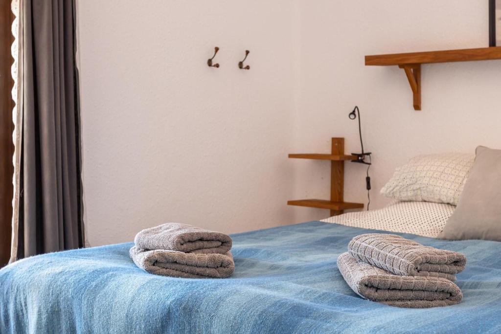 Posteľ alebo postele v izbe v ubytovaní Capistrano Playa