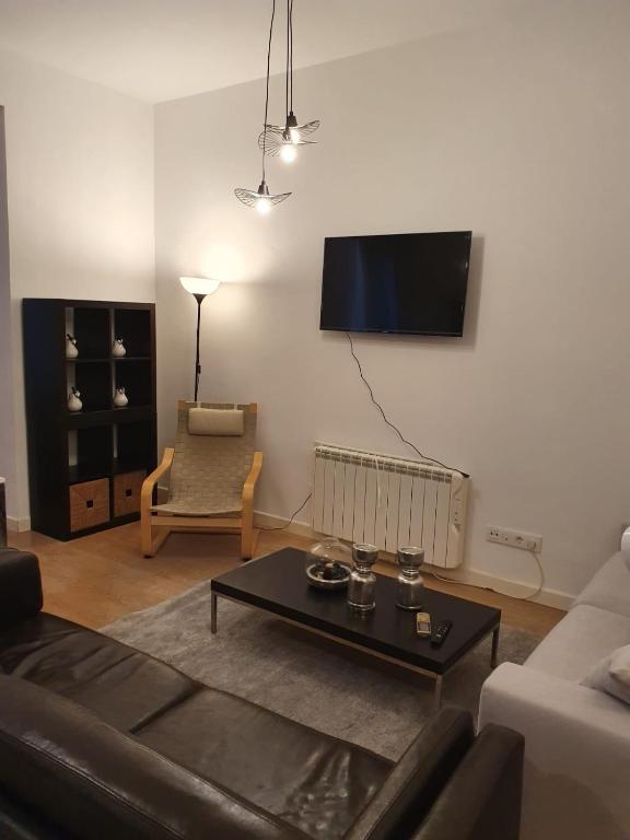 Una televisión o centro de entretenimiento en Le Petit Palü-Fuencarral