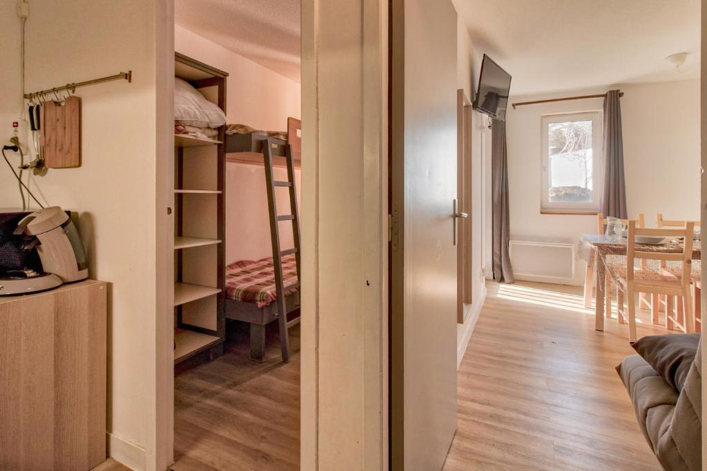 Postel nebo postele na pokoji v ubytování Accès direct aux pistes - appartement pour 4