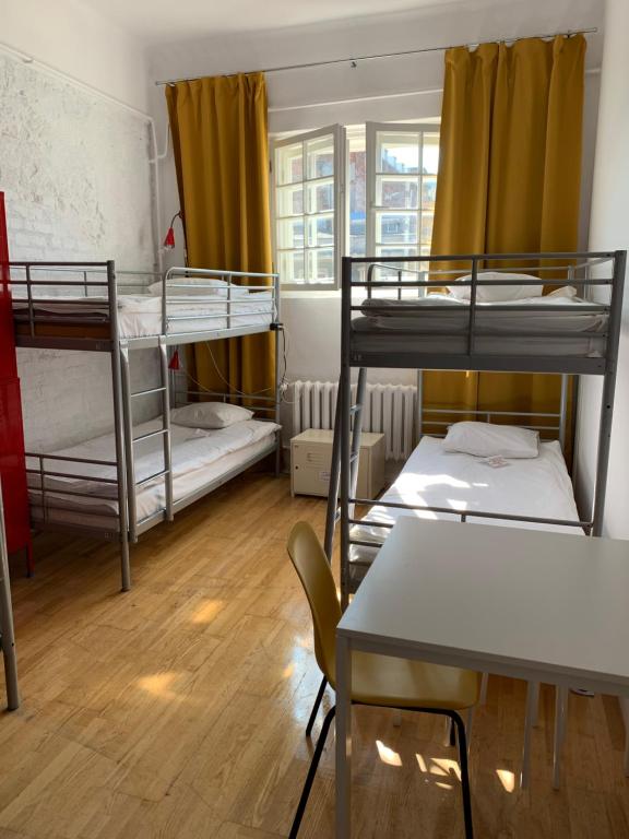 Posteľ alebo postele v izbe v ubytovaní New World St Hostel and Private Room