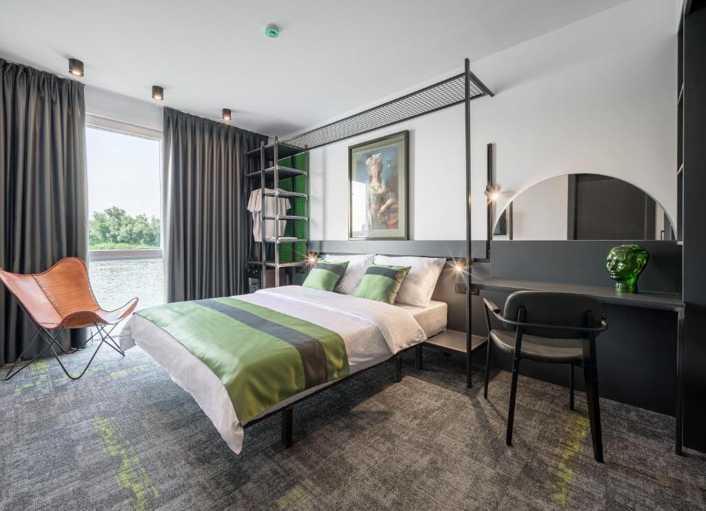 Postel nebo postele na pokoji v ubytování Joy 5 Hotel & SPA