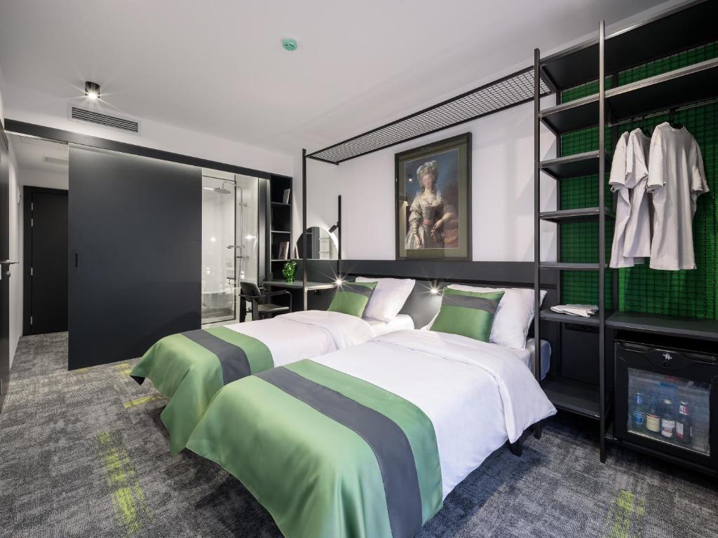 Postel nebo postele na pokoji v ubytování Joy 5 Hotel & SPA
