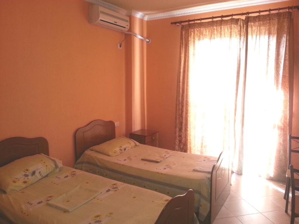 Postel nebo postele na pokoji v ubytování Hotel Palma