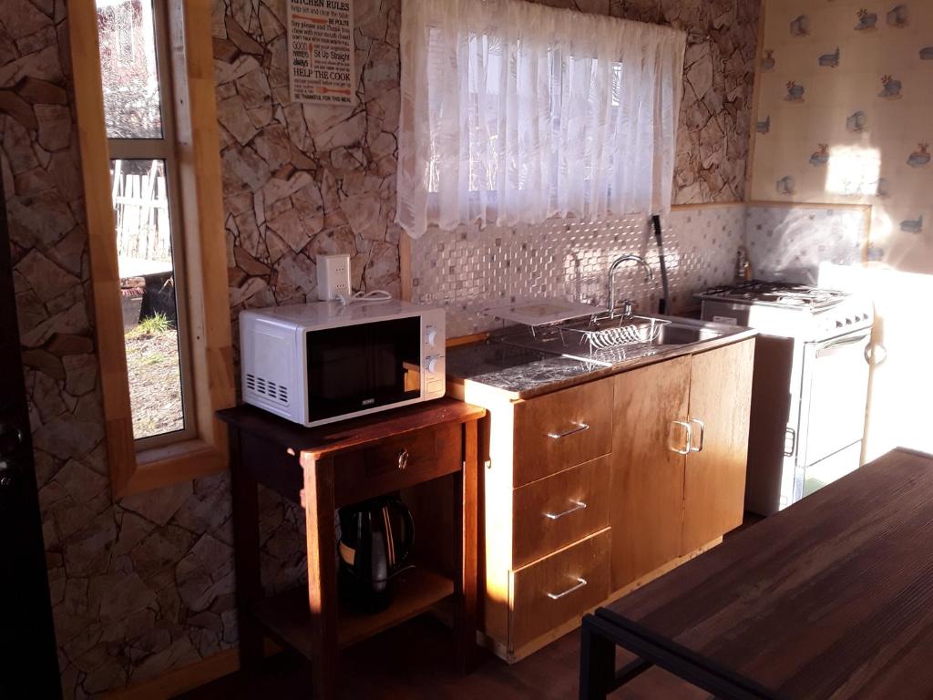 Kuchyň nebo kuchyňský kout v ubytování Hostal Don Pedro