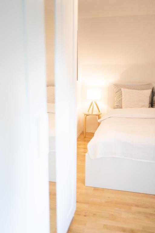 Postel nebo postele na pokoji v ubytování Apartment 27