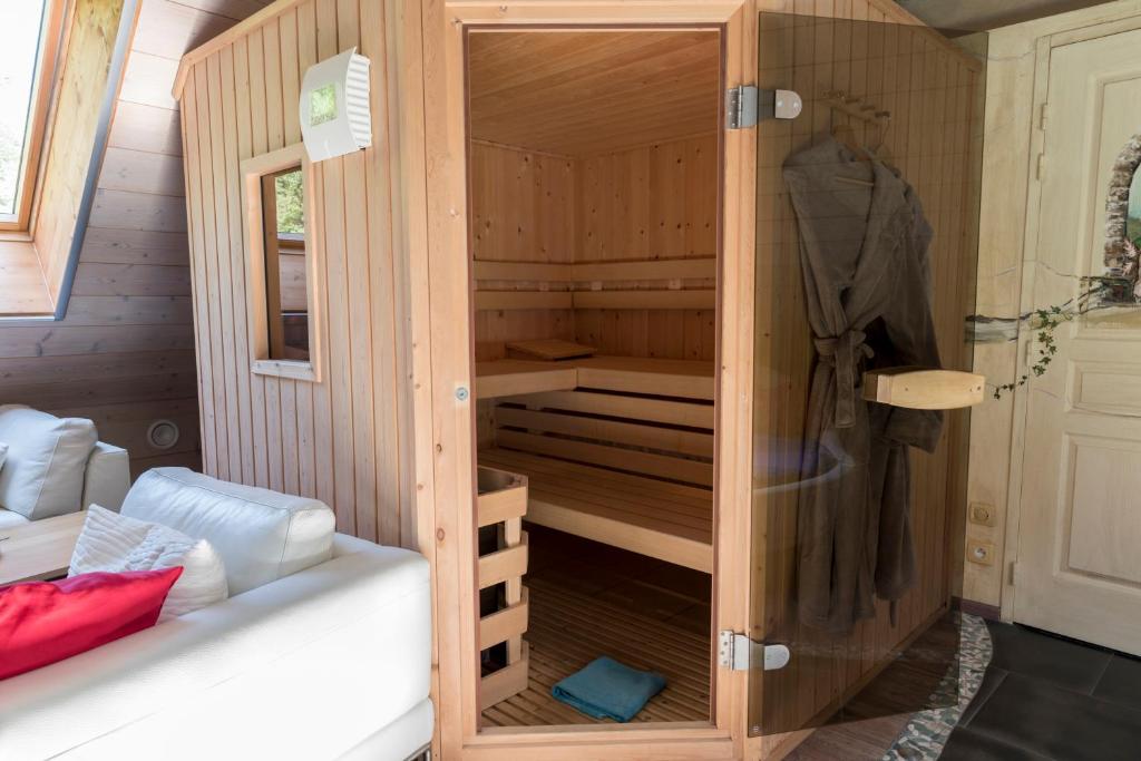 Postel nebo postele na pokoji v ubytování Domaine et chambres d'Hôtes des Fées