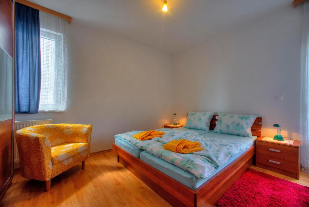 Posteľ alebo postele v izbe v ubytovaní Apartments Peran