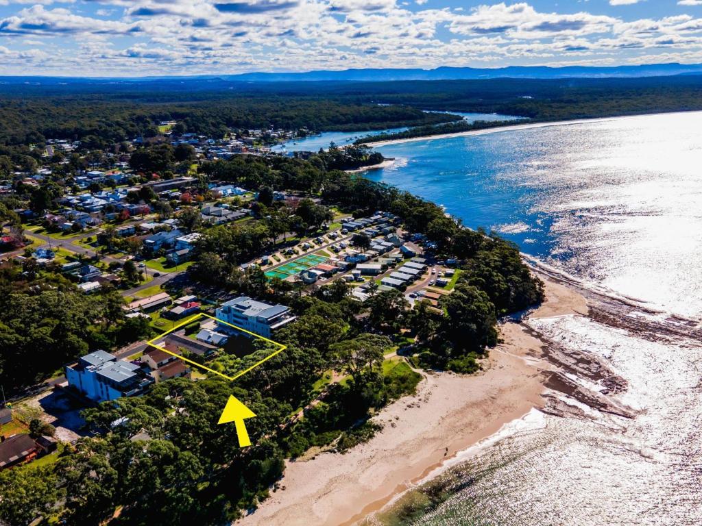 an aerial view of a resort on the beach at Beach Street Residence Huskisson in Huskisson