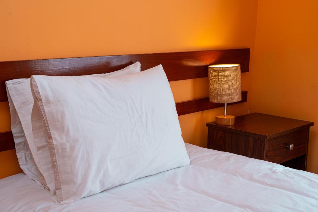Postel nebo postele na pokoji v ubytování Hotel Villarma