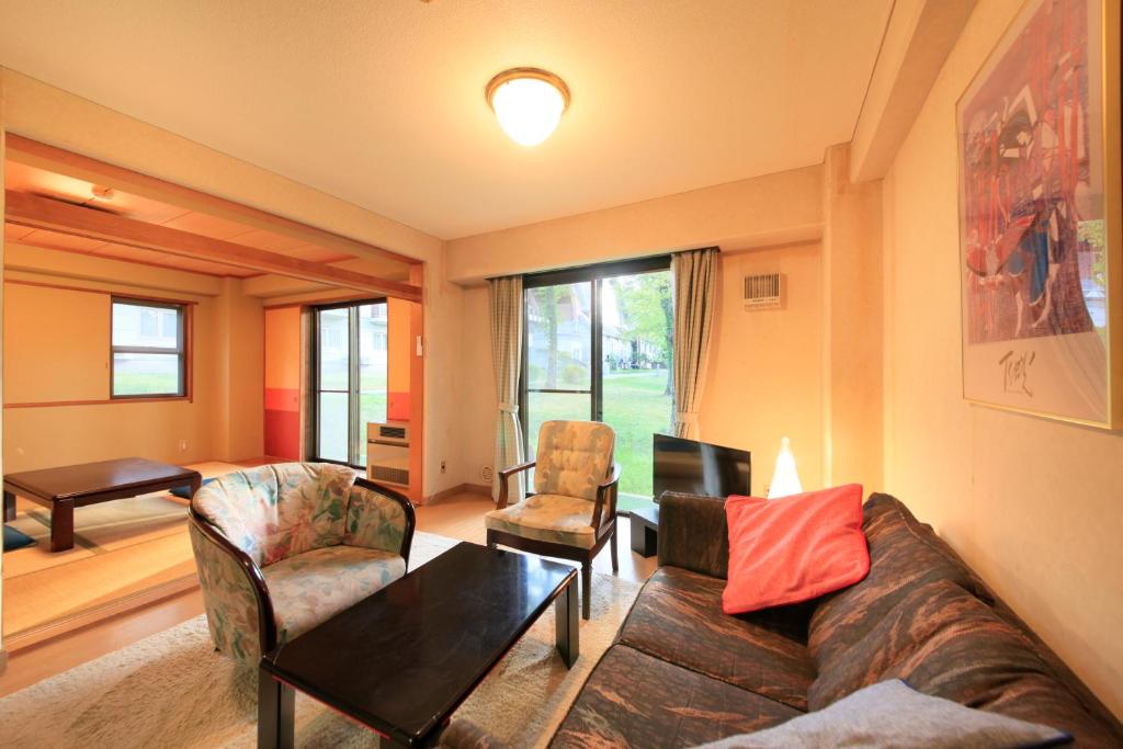 Posezení v ubytování Kishutetsudo Karuizawa Hotel