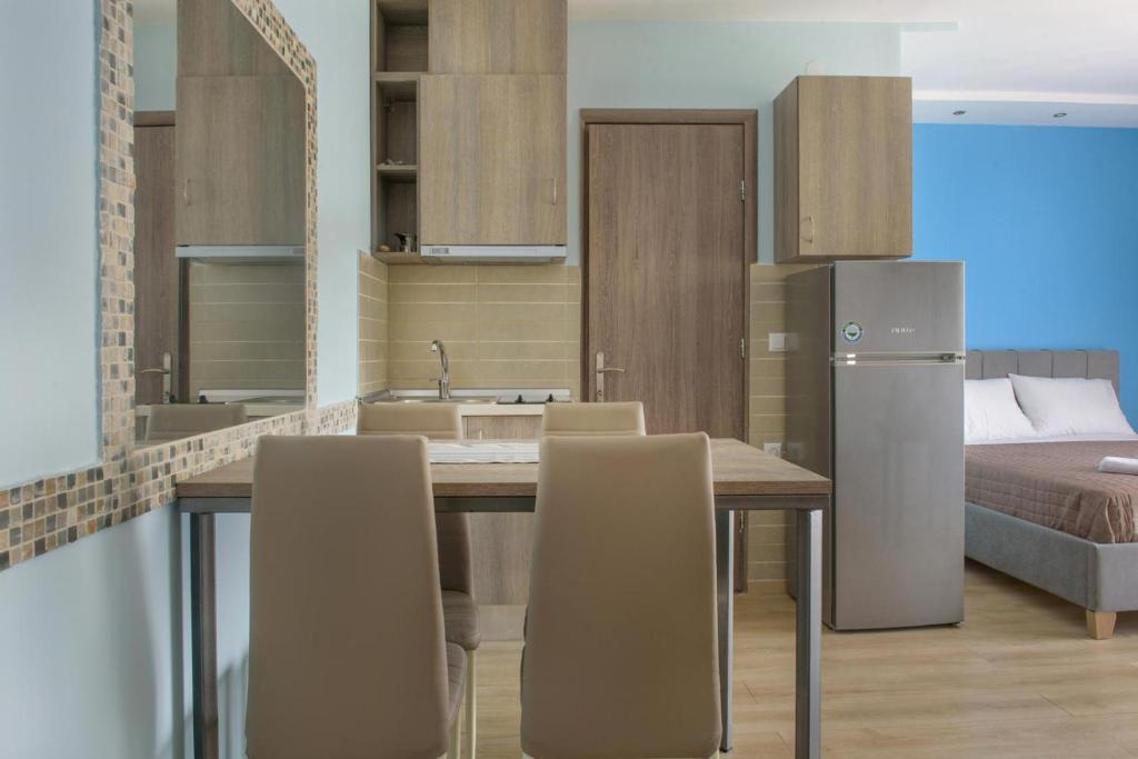 Kuchyň nebo kuchyňský kout v ubytování 3D iliadis Suites