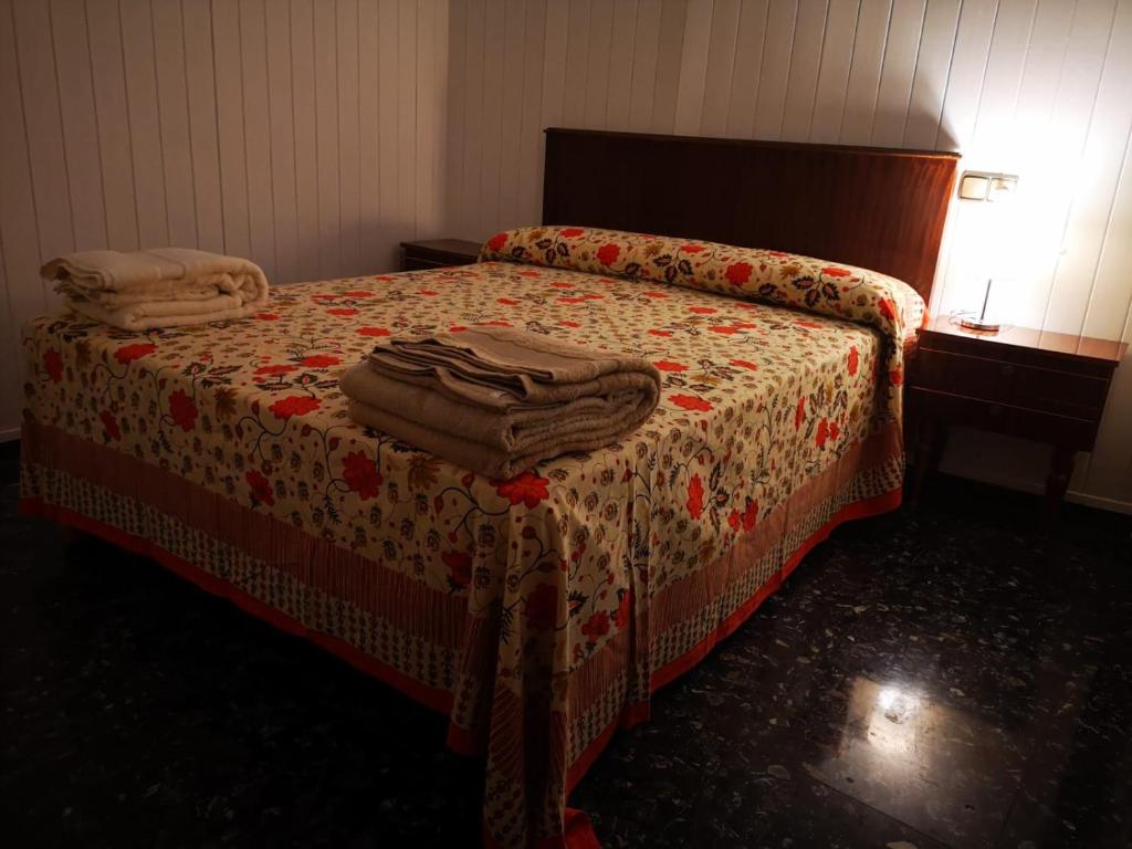 Postel nebo postele na pokoji v ubytování Casa La Lonja de Guadix