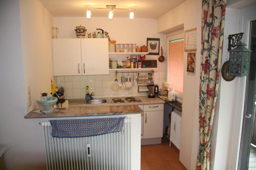 Kuchyňa alebo kuchynka v ubytovaní Alpenappartements Domicil include Jokercard