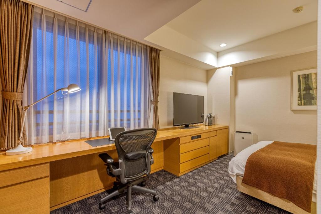 TV a/nebo společenská místnost v ubytování Hotel Grand Fuji