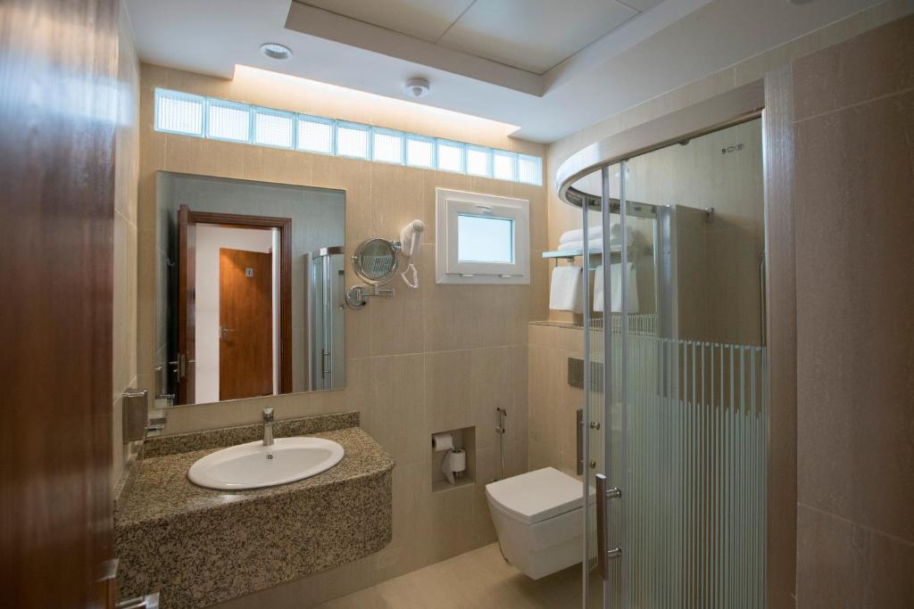 Koupelna v ubytování Asahalah Farm Pool Villas
