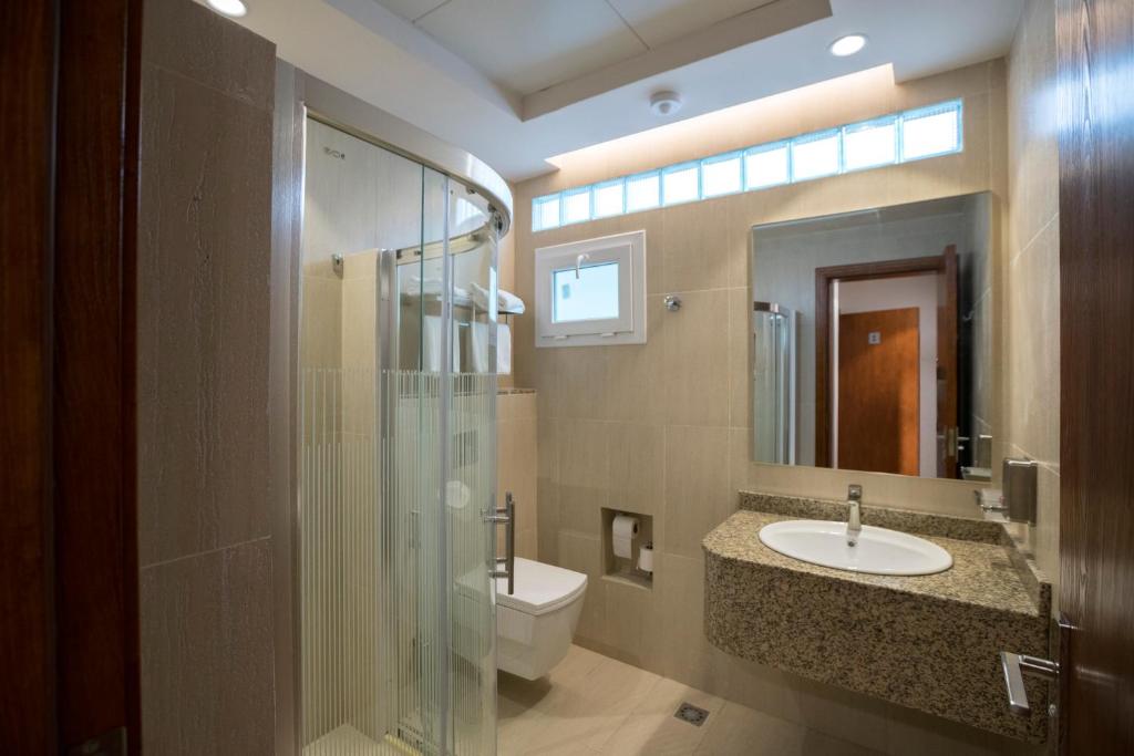 Koupelna v ubytování Asahalah Farm Pool Villas