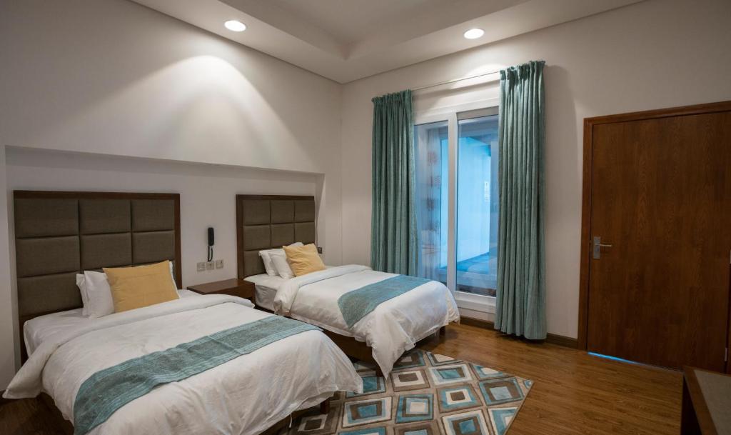 Postel nebo postele na pokoji v ubytování Asahalah Farm Pool Villas