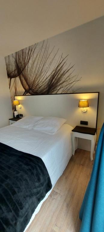 Postel nebo postele na pokoji v ubytování Hotel La Cascada