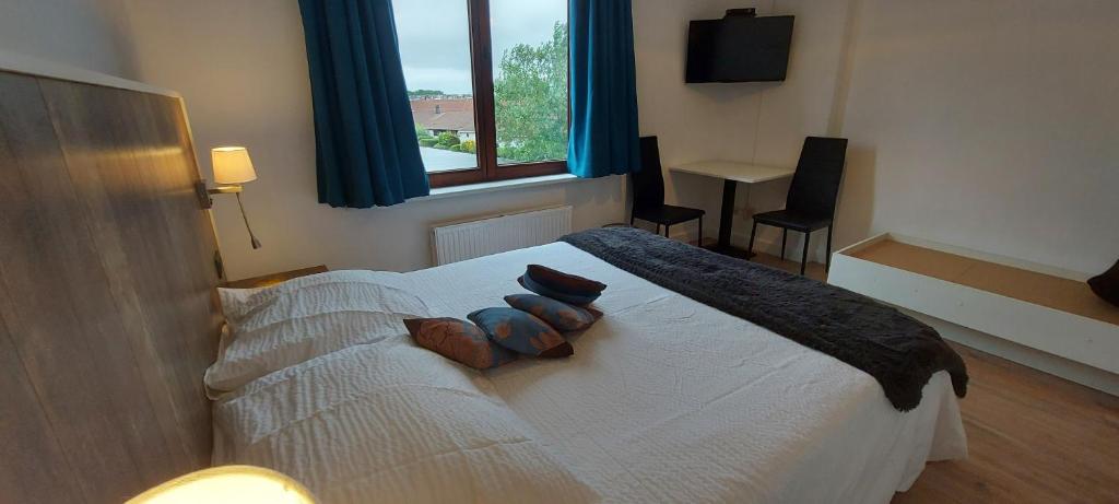 Postel nebo postele na pokoji v ubytování Hotel La Cascada