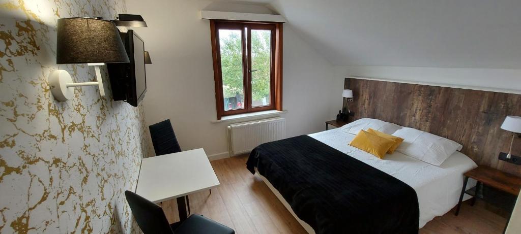 Postel nebo postele na pokoji v ubytování Hotel La Cascada