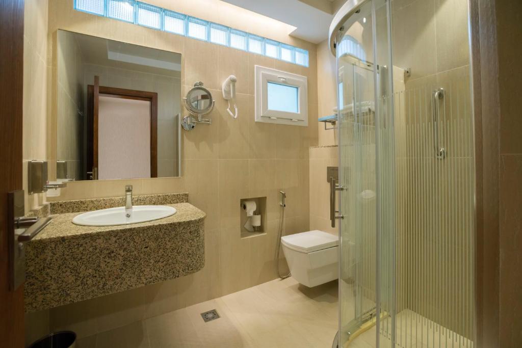 Koupelna v ubytování Asahalah Farm Pool Villas