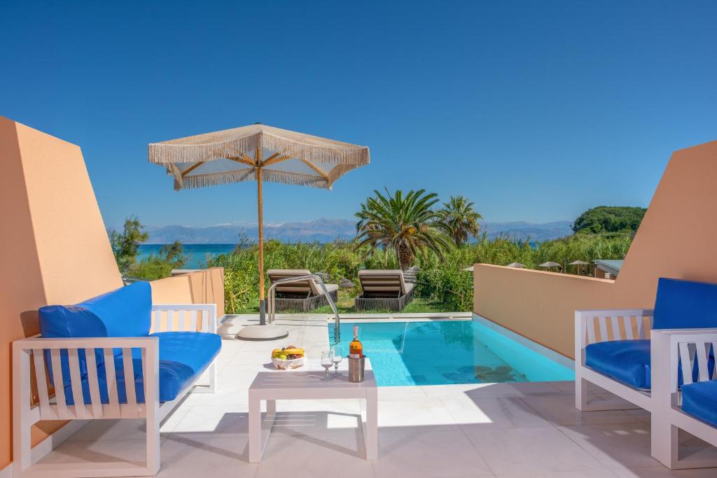 Bazén v ubytování Ibiscus Corfu Hotel nebo v jeho okolí