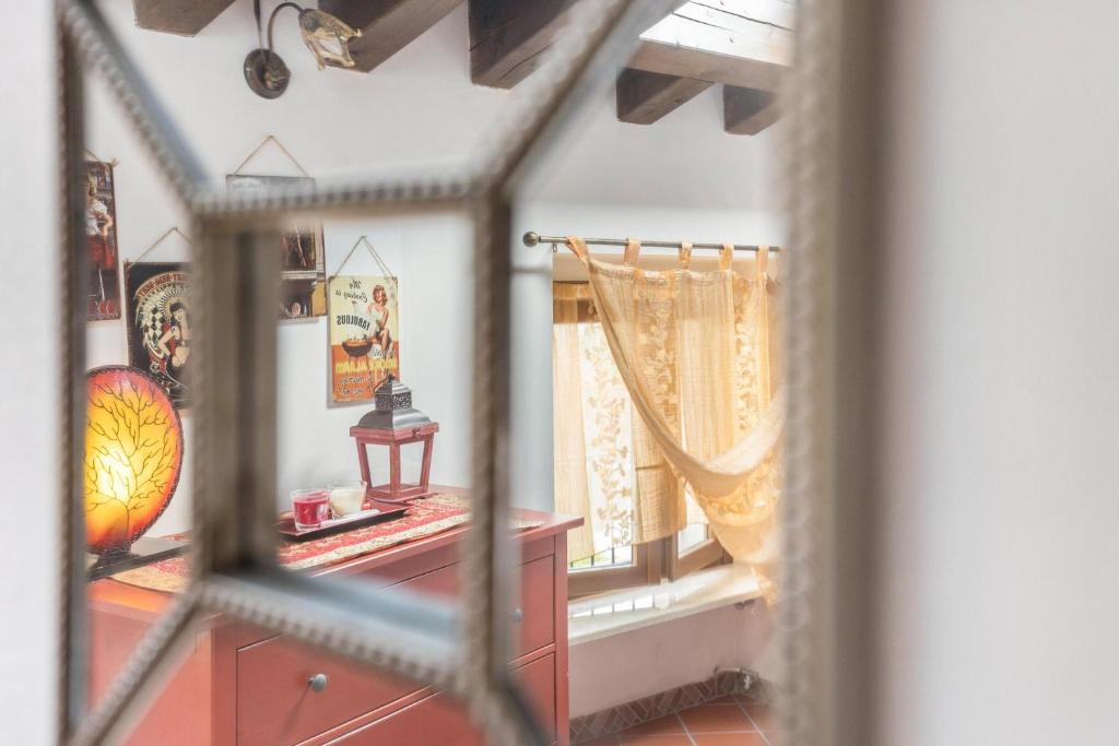 A bed or beds in a room at Le Case di Erminia Country Valeggio