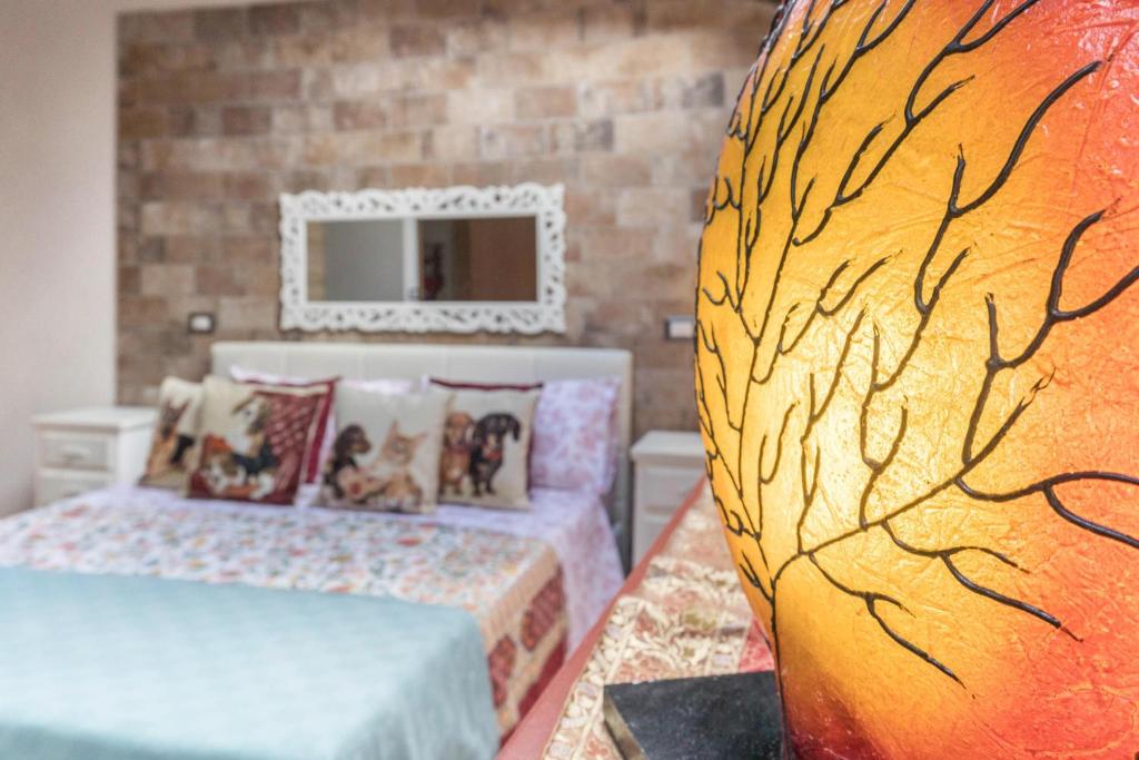 A bed or beds in a room at Le Case di Erminia Country Valeggio