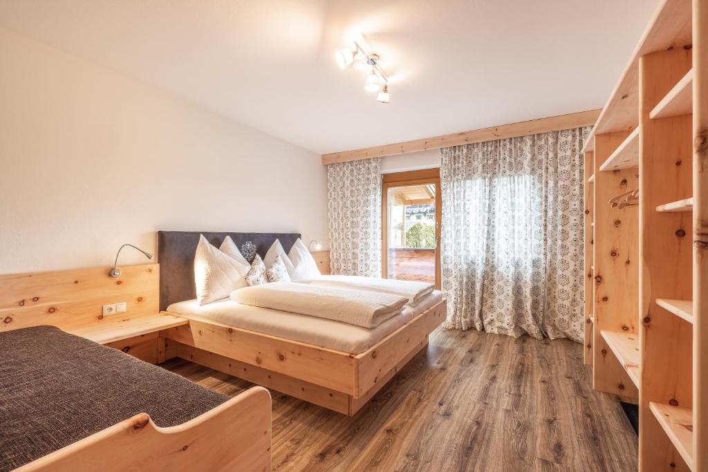 Postel nebo postele na pokoji v ubytování Haus Rabl