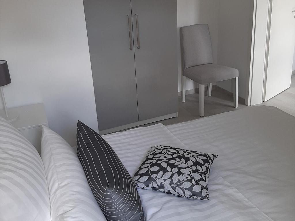 Postel nebo postele na pokoji v ubytování Bugenhagen - Classic Appartements