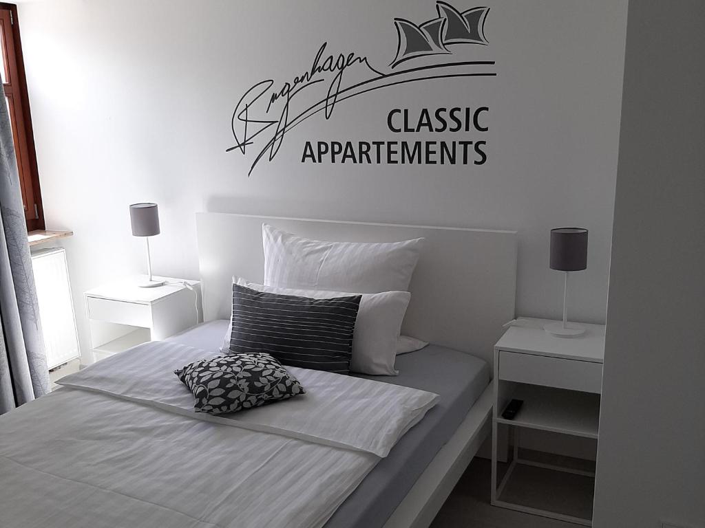 Postel nebo postele na pokoji v ubytování Bugenhagen - Classic Appartements