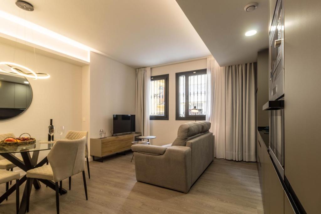 Televízia a/alebo spoločenská miestnosť v ubytovaní Malaga a Tu Ritmo! Edificio muy tranquilo y moderno!