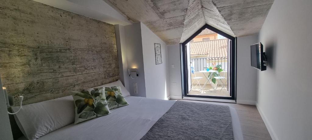 Кровать или кровати в номере Malaga a Tu Ritmo! Edificio muy tranquilo y moderno!