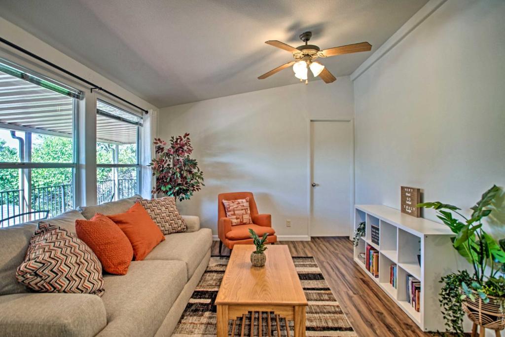 a living room with a couch and a ceiling fan at Sedona Home with View, Half-Mi to Chimney Rock! in Sedona