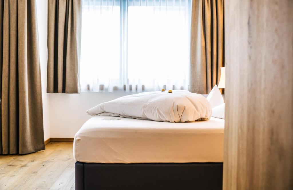 Postel nebo postele na pokoji v ubytování Hotel Andino