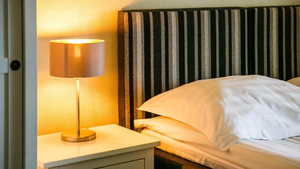 Postel nebo postele na pokoji v ubytování Ungru Guesthouse