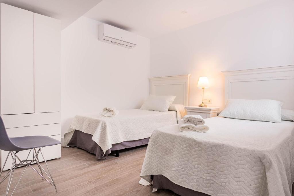 Posteľ alebo postele v izbe v ubytovaní Maravilloso loft dúplex casco histórico