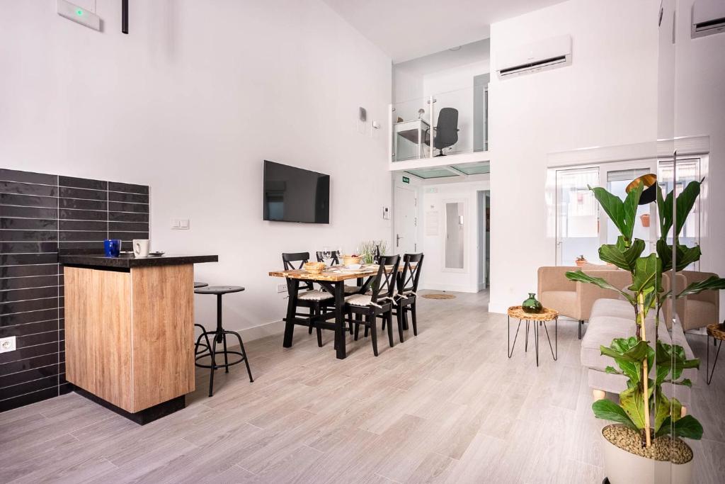 Televízia a/alebo spoločenská miestnosť v ubytovaní Maravilloso loft dúplex casco histórico