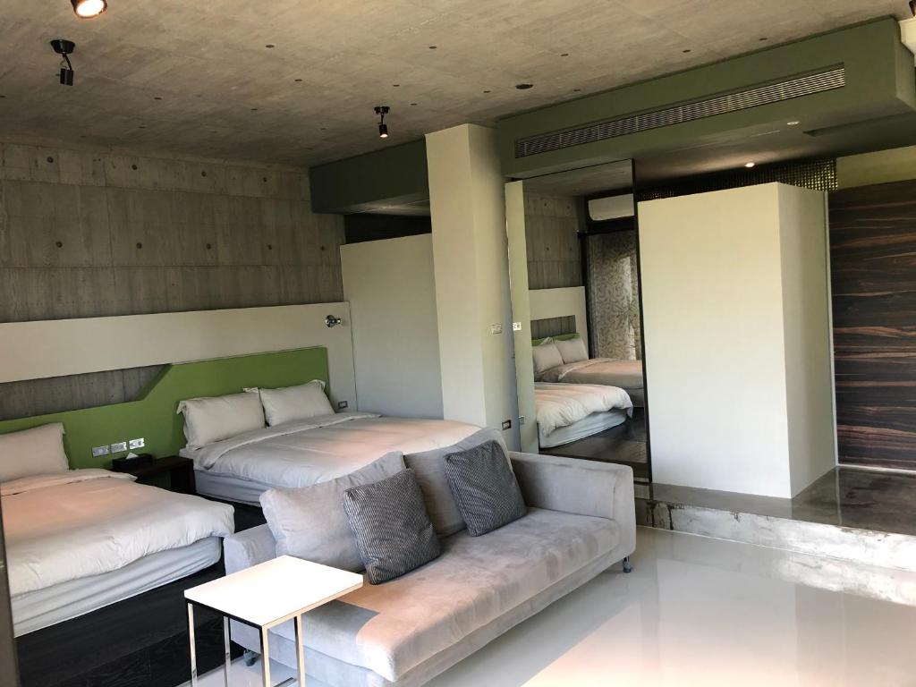 Postel nebo postele na pokoji v ubytování One Piece B&B
