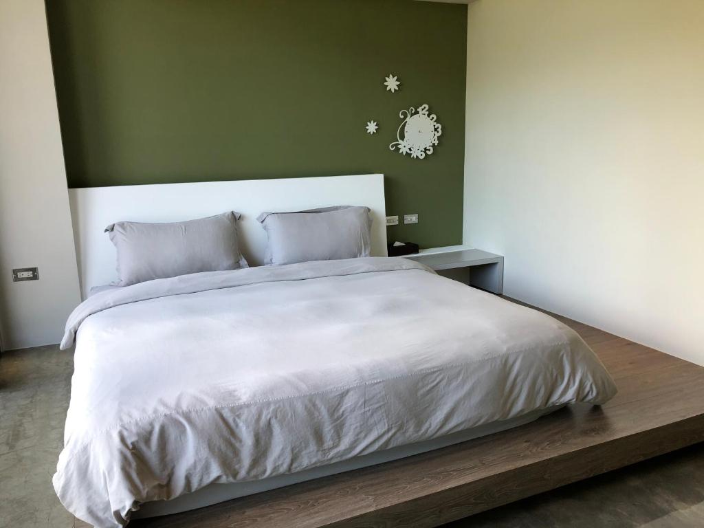Postel nebo postele na pokoji v ubytování One Piece B&B