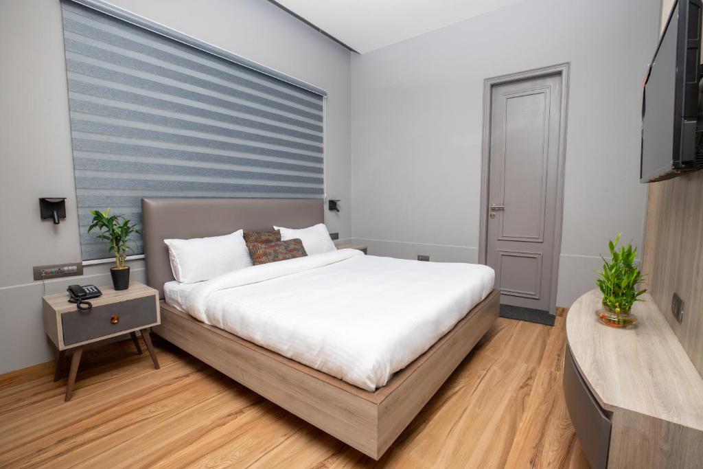 Ένα ή περισσότερα κρεβάτια σε δωμάτιο στο Hotel Viasora