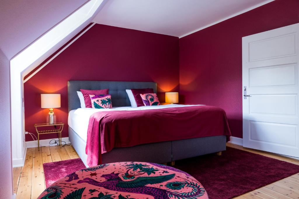 Postel nebo postele na pokoji v ubytování Gem Suites Holiday Apartments