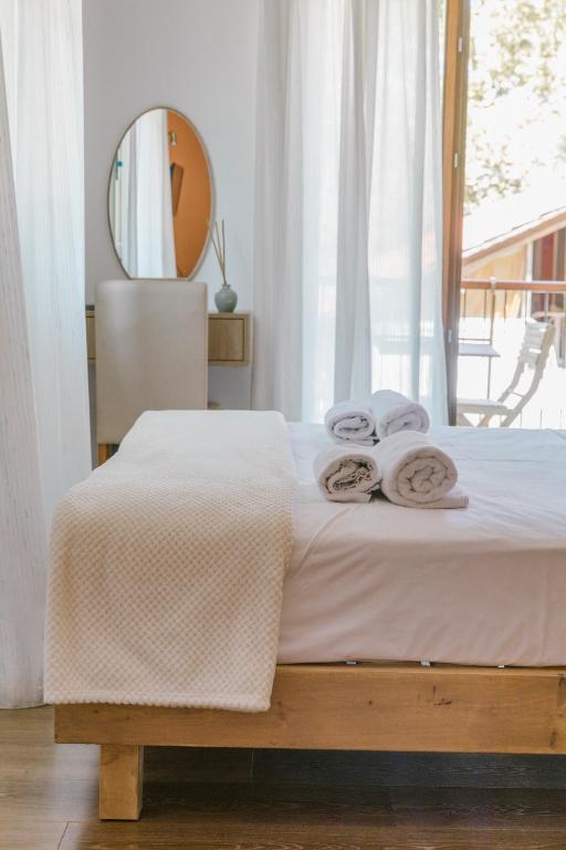 Postel nebo postele na pokoji v ubytování Olympos Hotel