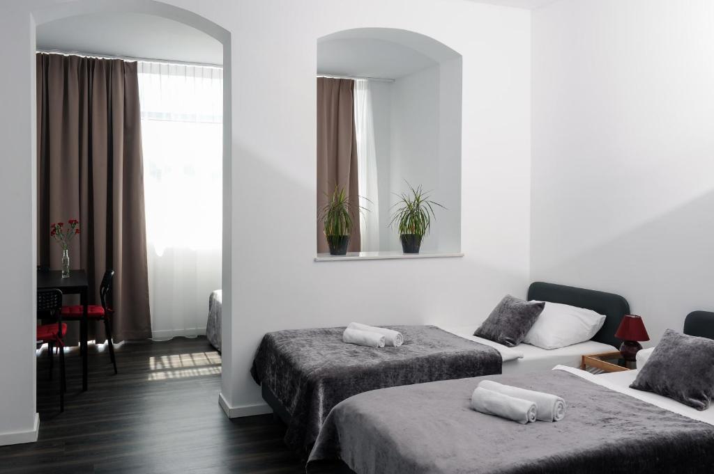 Postel nebo postele na pokoji v ubytování Aparthotel Lenau