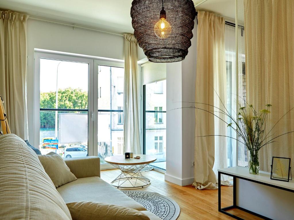 Posezení v ubytování About Art Apartments