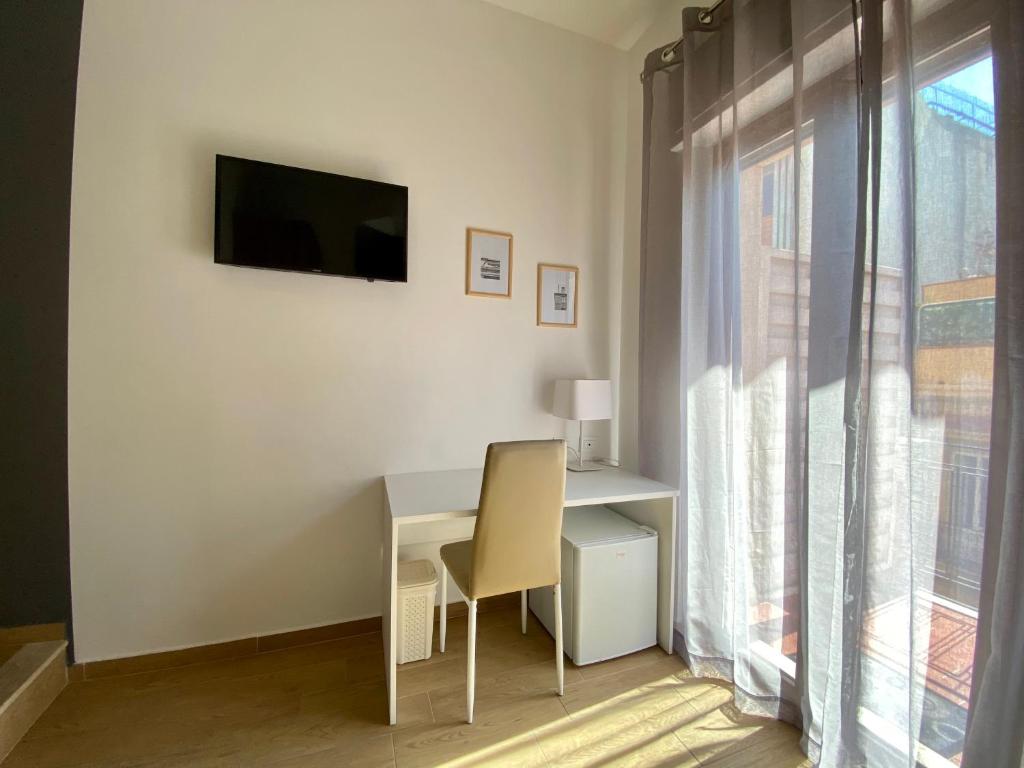 TV a/nebo společenská místnost v ubytování Le Muse