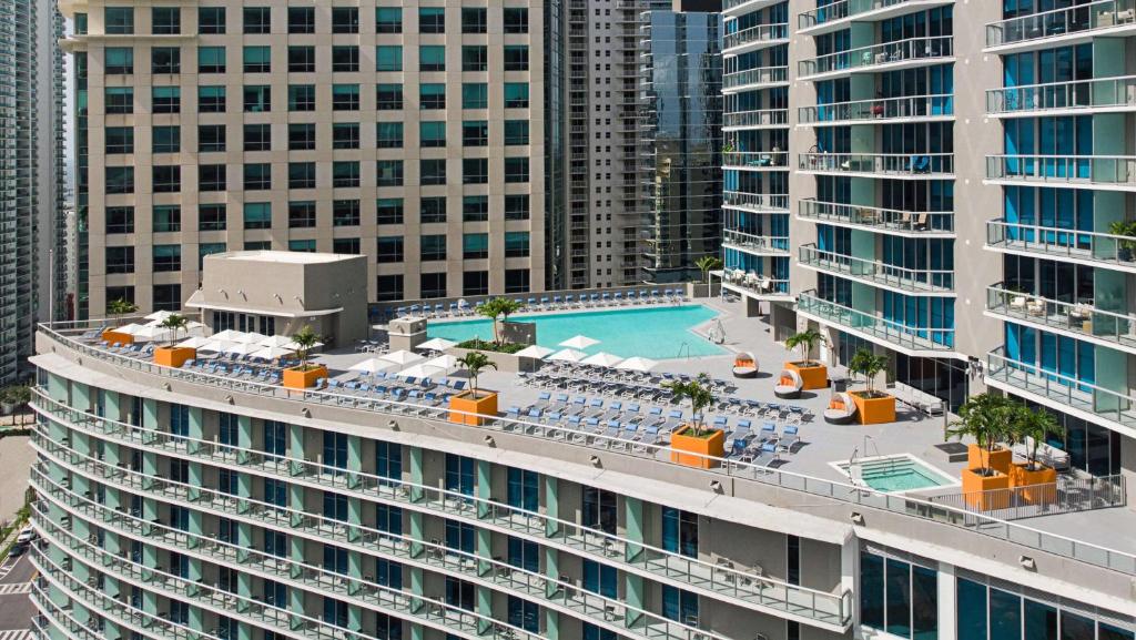 an aerial view of a building with a pool at Hyatt Centric Brickell Miami in Miami