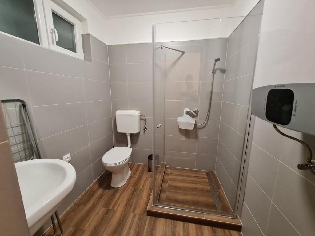 Kúpeľňa v ubytovaní Holdudvar Apartman