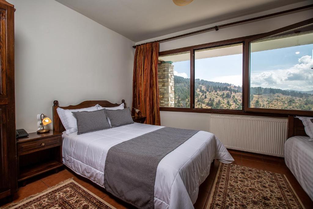 Łóżko lub łóżka w pokoju w obiekcie La Noi Guesthouse