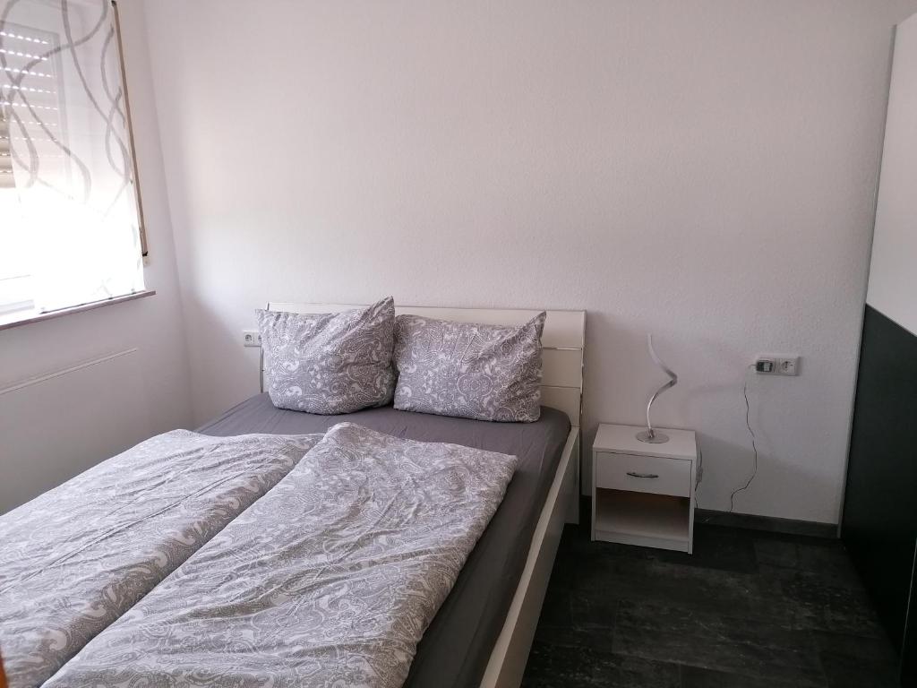 Postel nebo postele na pokoji v ubytování Stollis FeWo